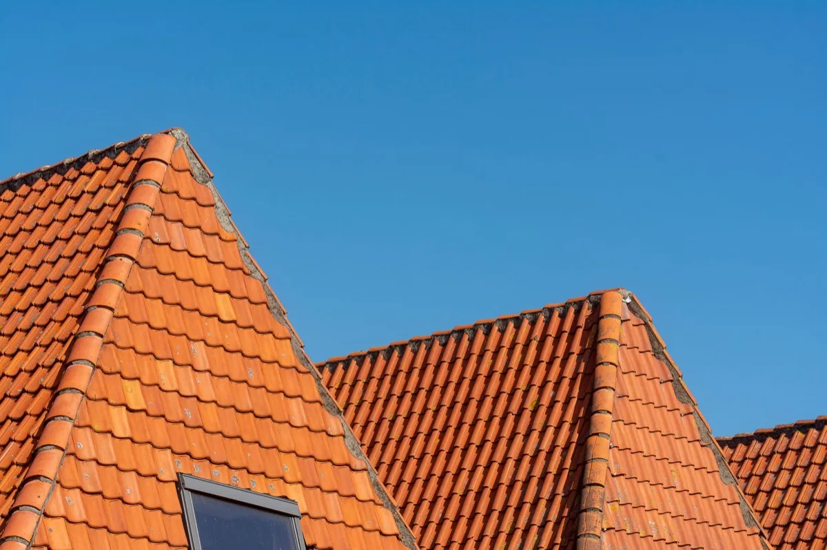 Clay barrel tile rooflines on homes in Parma, OH